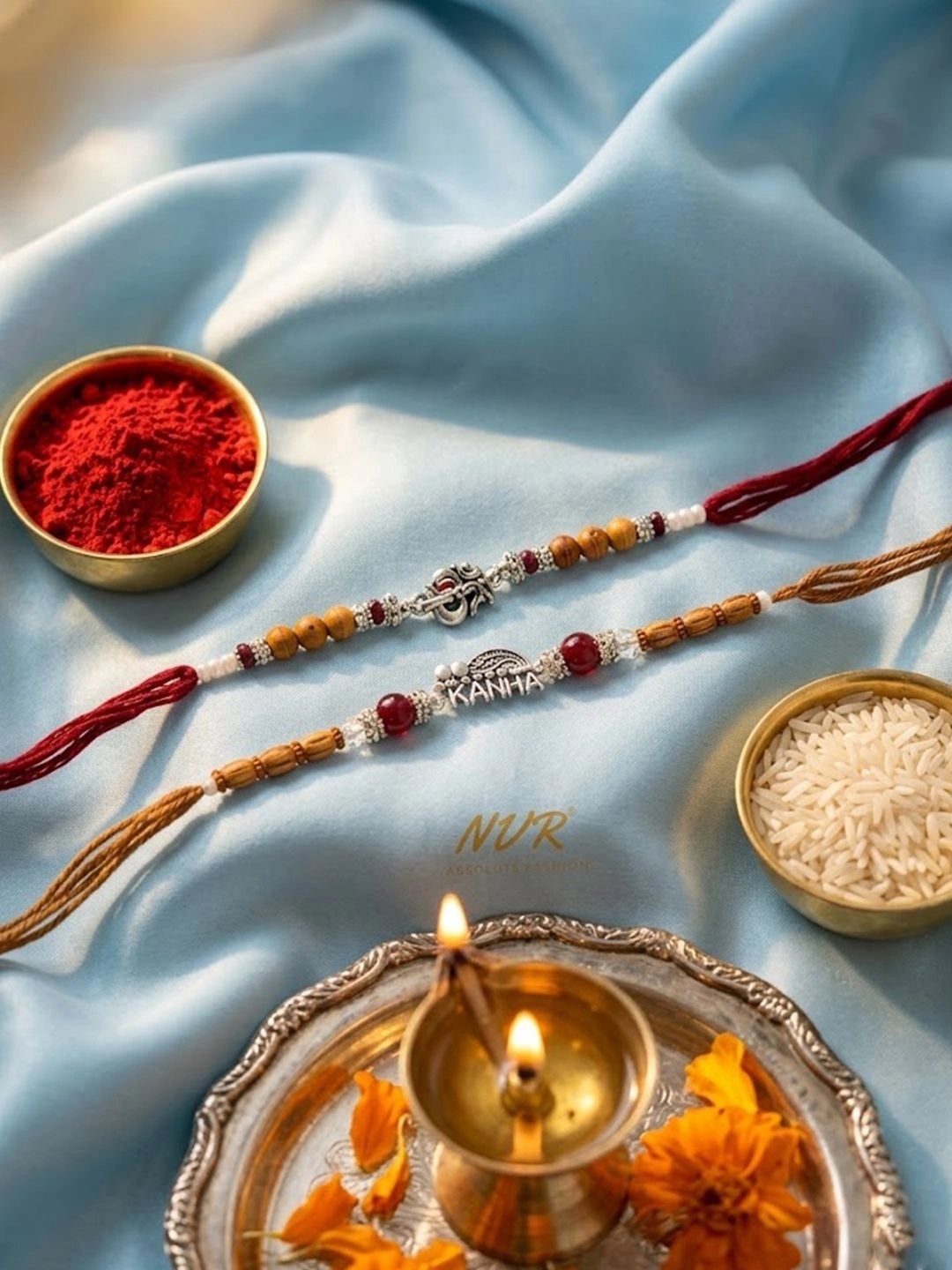 Anouk Set Of 2 Silver Toned Religious Rakhi Thread Rakhi Roli Chawal Chandan Mishri