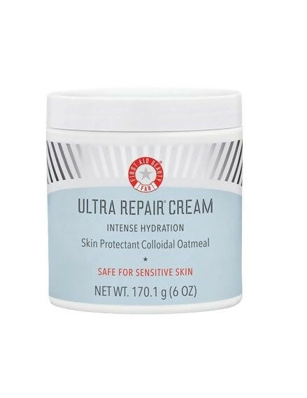 First Aid Beauty Ultra Repair Cream in a jar, a rich moisturizer for soothing and hydrating dry, sensitive skin.