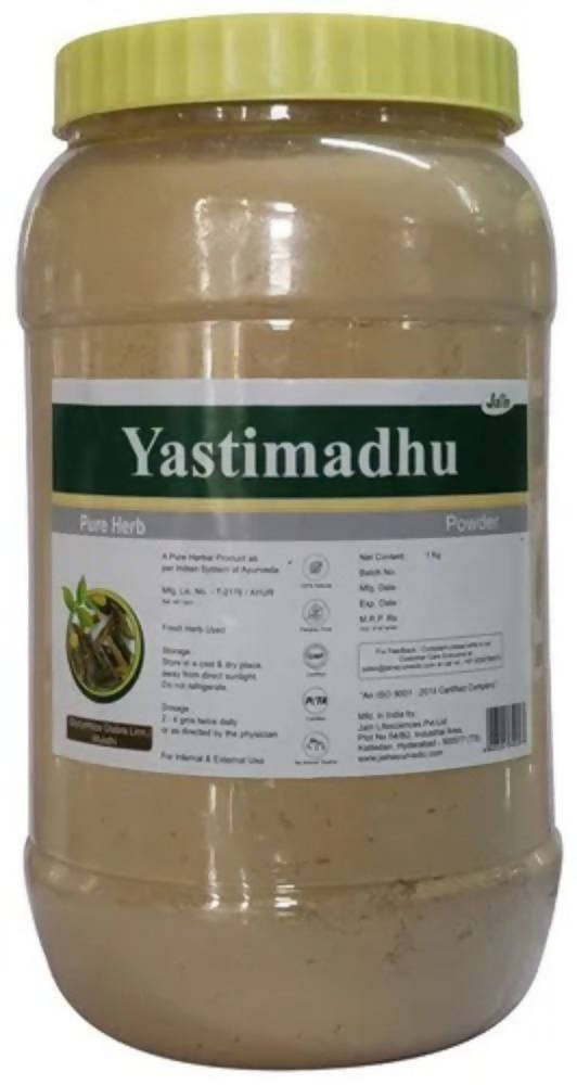 Fine Jain Yastimadhu powder from Sri Jain Ayurvedic Pharmacy, showcasing the smooth, light brown herbal powder in a container.