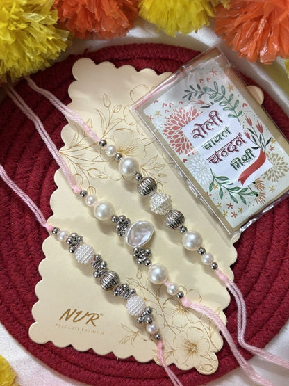 Anouk Set Of 3 White Pearls Thread Rakhi With Roli Chawal Chandan Mishri