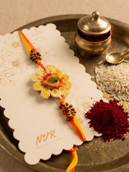 Anouk Yellow Floral Seed Thread Rakhi With Roli Chawal Chandan Mishri