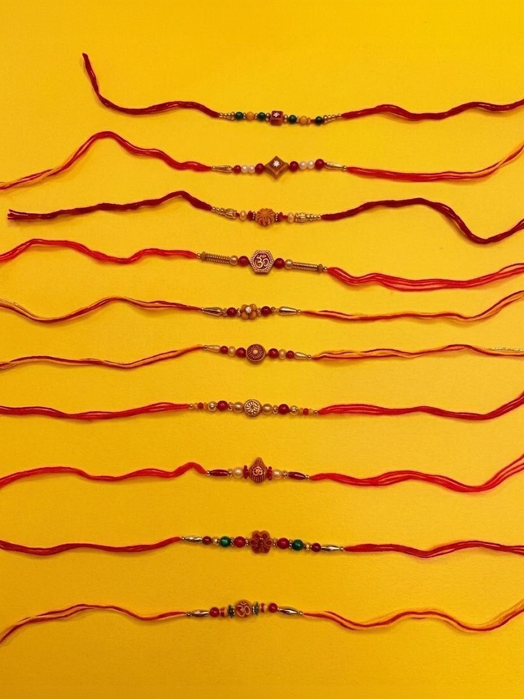 Anouk Set Of 10 Multicolor Designer Thread Rakhi With Roli Chawal Chandan Mishri