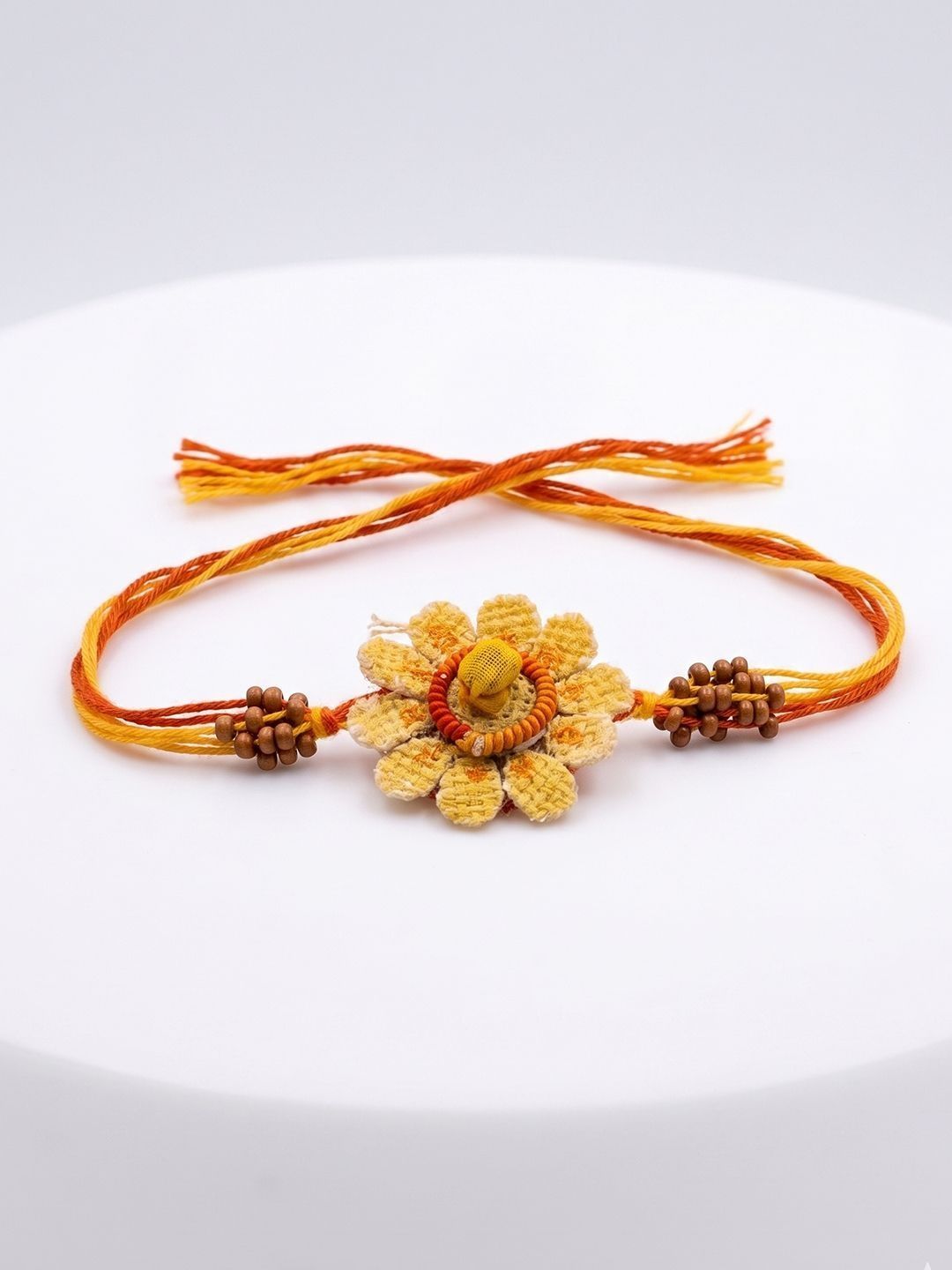 Anouk Yellow Floral Seed Thread Rakhi With Roli Chawal Chandan Mishri