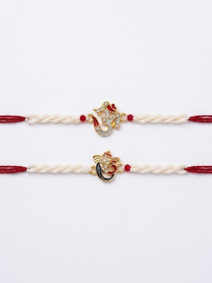Anouk Set Of 2 White Pearls Om & Ganesh Ji Thread Rakhi With Roli Chawal Chandan Mishri